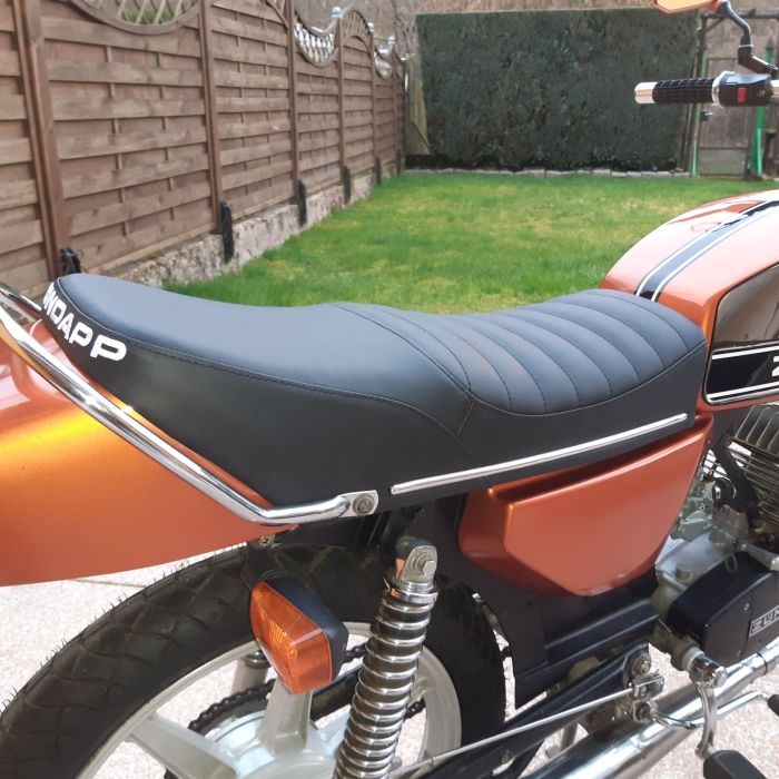 Sculpture de l'assise d'une moto